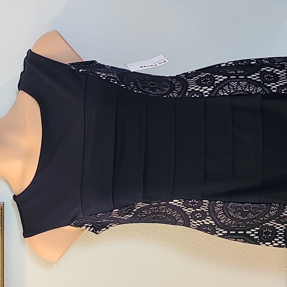 New Never Worn Navy knit pull-over dress size 12 (Encore)